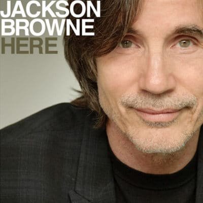 Close-up of Jackson Browne smiling on album cover titled 'Here'.