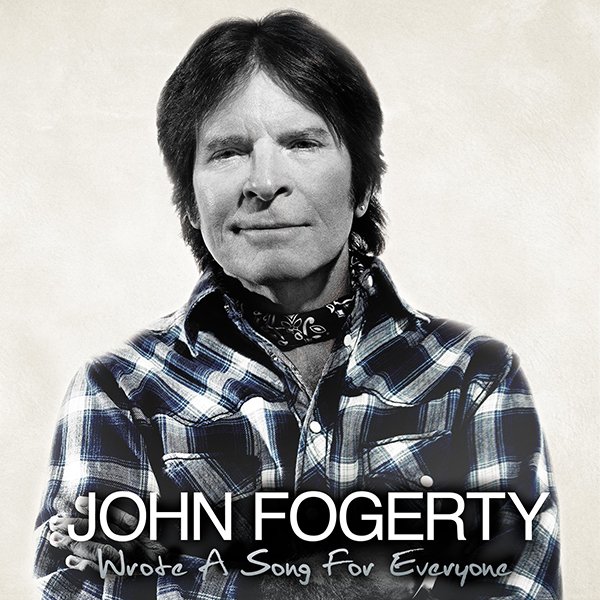 Black and white portrait of John Fogerty wearing a plaid shirt and bandana, with his arms crossed. Text overlay: 'JOHN FOGERTY Wrote A Song For Everyone.'