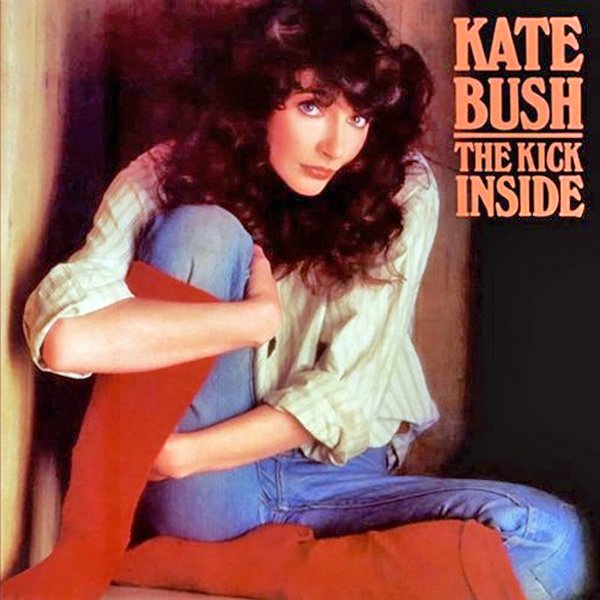 Album cover featuring Kate Bush sitting with her knees drawn up, wearing a striped shirt and jeans, with text reading 'Kate Bush The Kick Inside' in the top right corner.