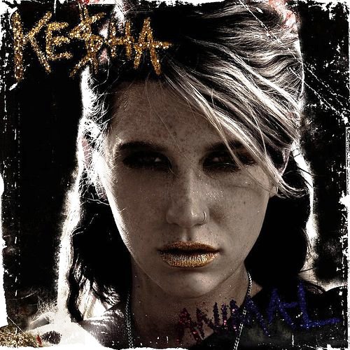 Close-up of a woman with bold makeup, a nose ring, and styled hair, with the words 'K-Feel' and 'Amanda' written in glittery gold and purple around her face.