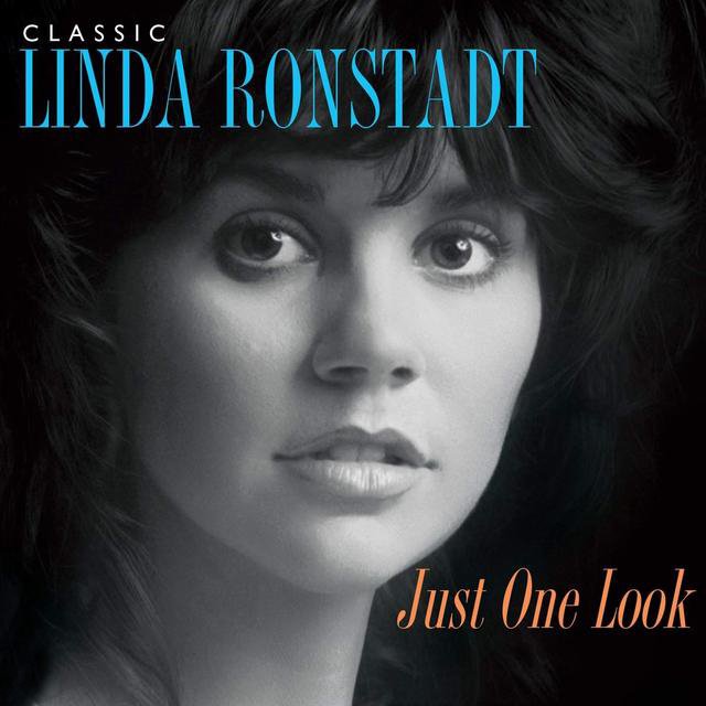 Cover of a music album featuring a black and white portrait of Linda Ronstadt with blue and orange text, titled 'Just One Look'.