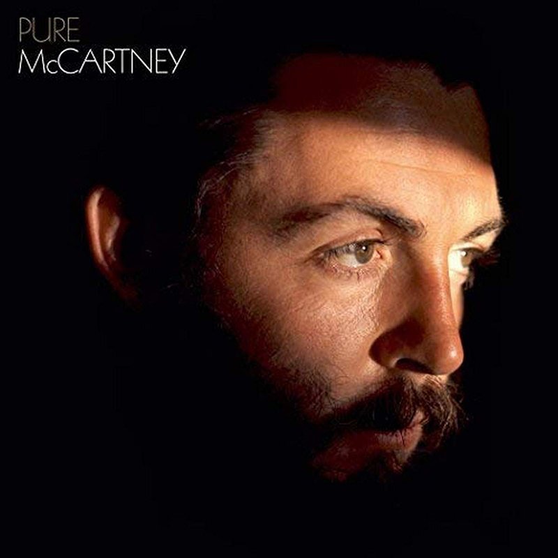 Close-up of a man with a beard and mustache, looking to the right, with the text 'PURE McCARTNEY' in the top left corner.