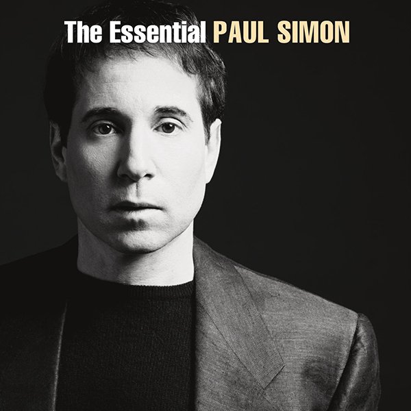 Album cover for 'The Essential Paul Simon' featuring a black and white portrait of Paul Simon looking directly at the camera
